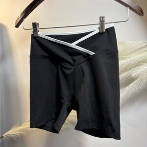 #54) Black high-waisted sport shorts with cross front detail #gym #activewear
